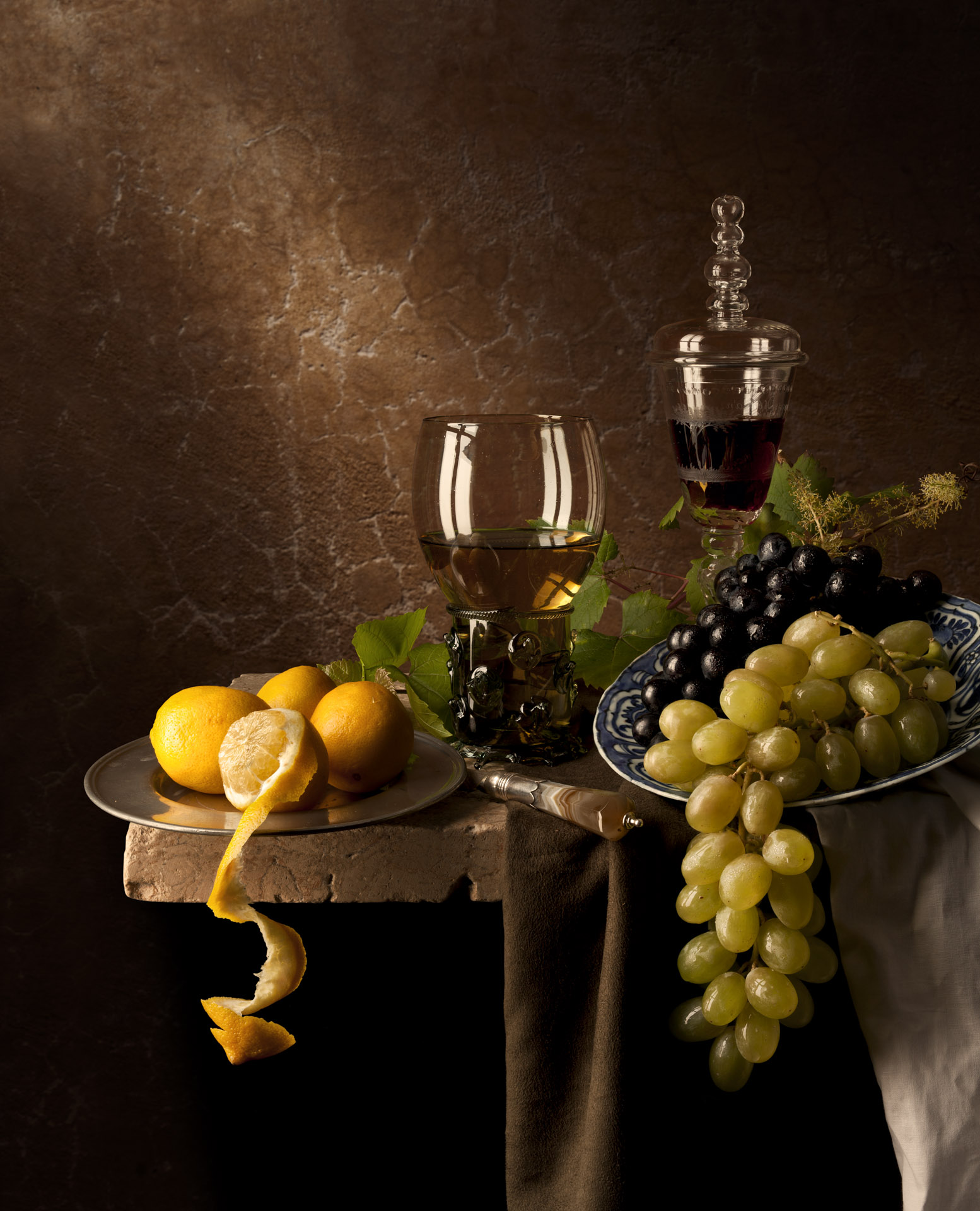 Still life with grapes and lemons