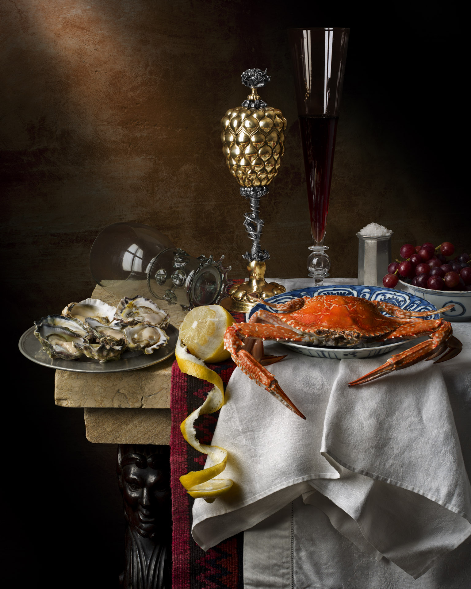 Still life with crab, pineapple cup and lemon